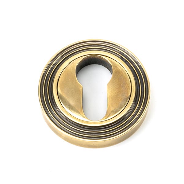Aged Brass Round Euro Escutcheon (Beehive)