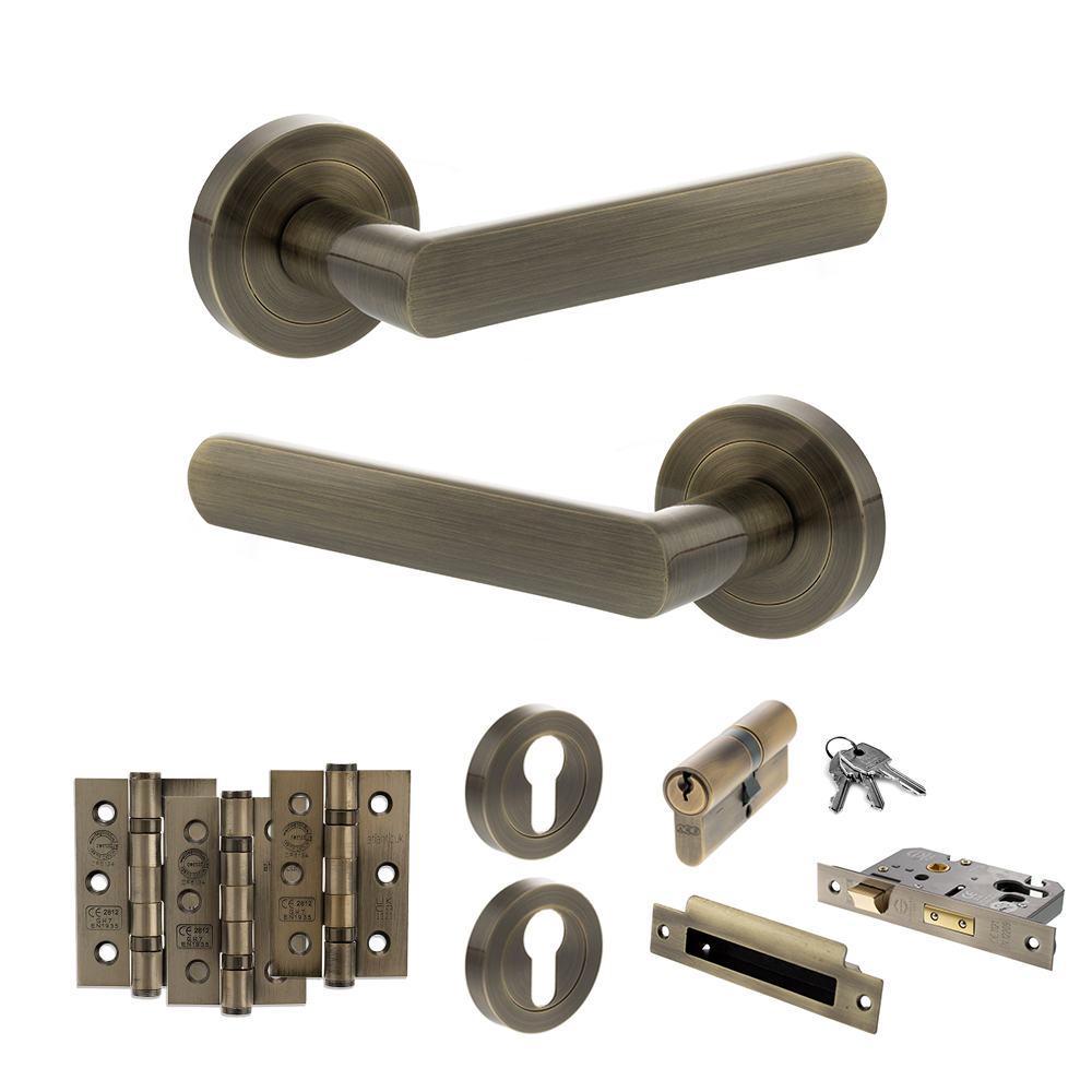 STATUS Carolina Door Handle Pack (Euro Lock Set - 2.5" CE Sashlock, 3" Fire Rated Hinges x3) - Antique Brass
