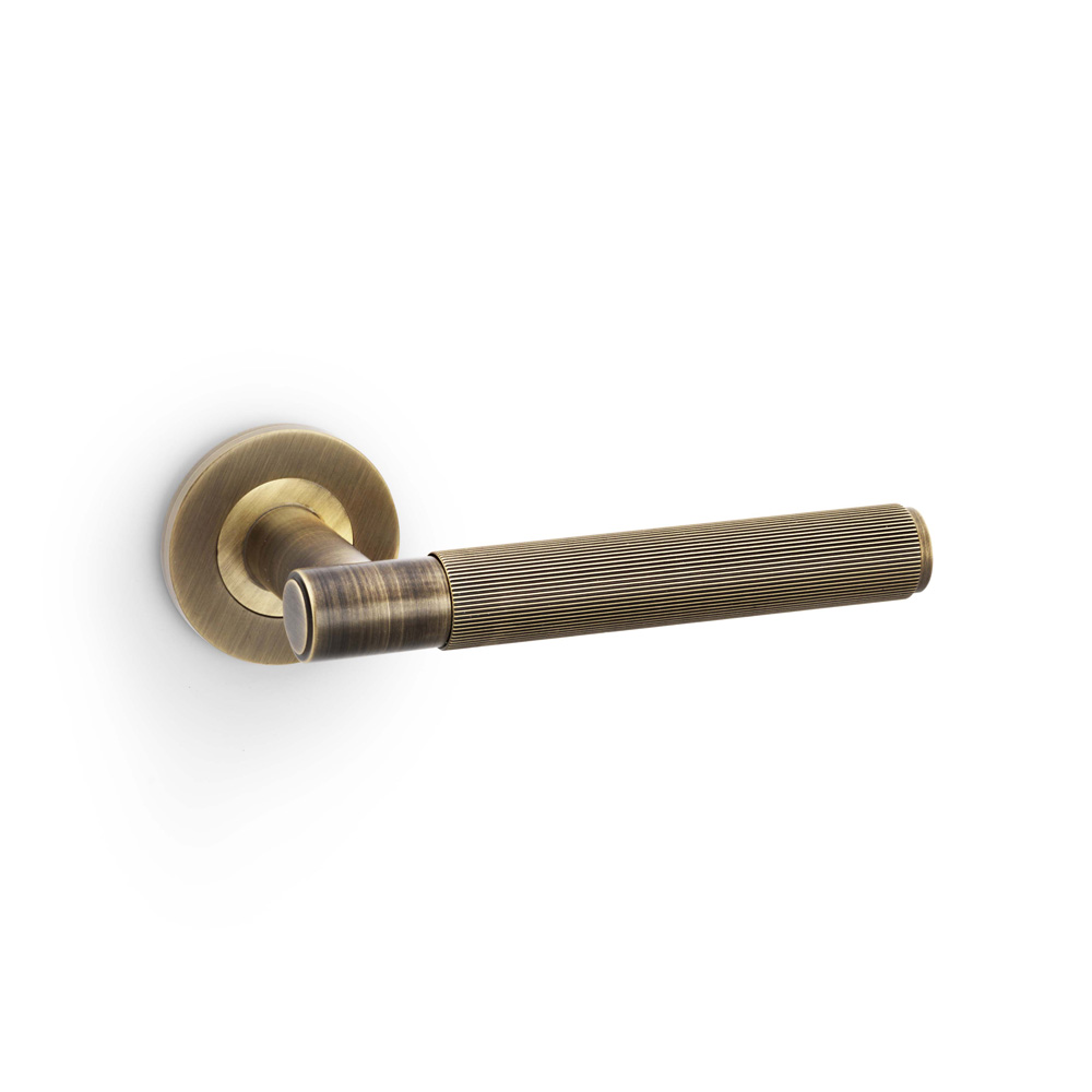 Alexander & Wilks Spitfire Reeded Lever on Round Rose - Antique Brass