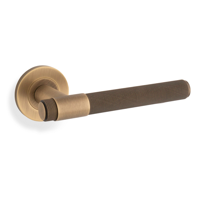 Knurled Kingstone Lever on Round Rose - Antique Brass