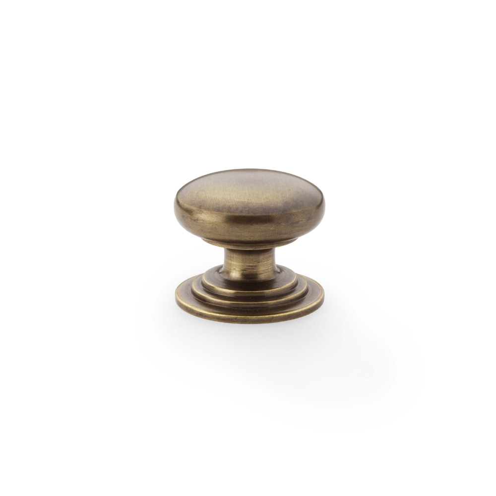 Alexander & Wilks Waltz Round Cupboard Knob on Stepped Rose - Antique Brass - 32mm