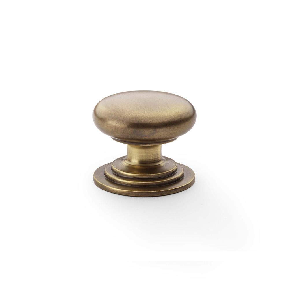 Alexander & Wilks Waltz Round Cupboard Knob on Stepped Rose - Antique Brass - 38mm